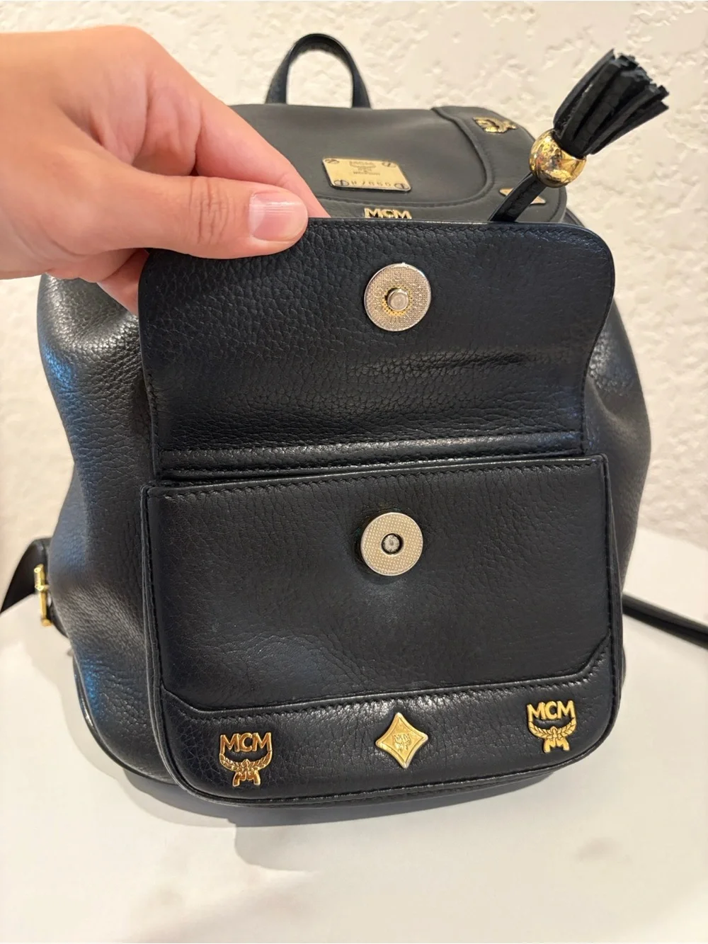 MCM Black Leather Drawstring Backpack with Gold Hardware